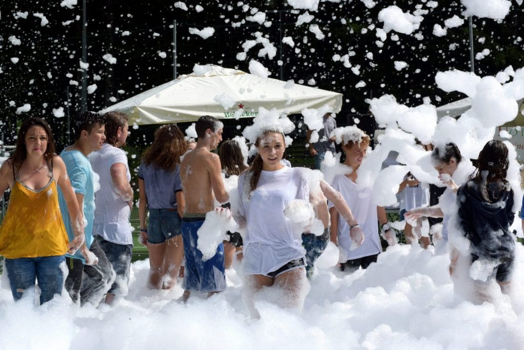 Kids taking photo in this awesome kids foam party that took place in L.A
